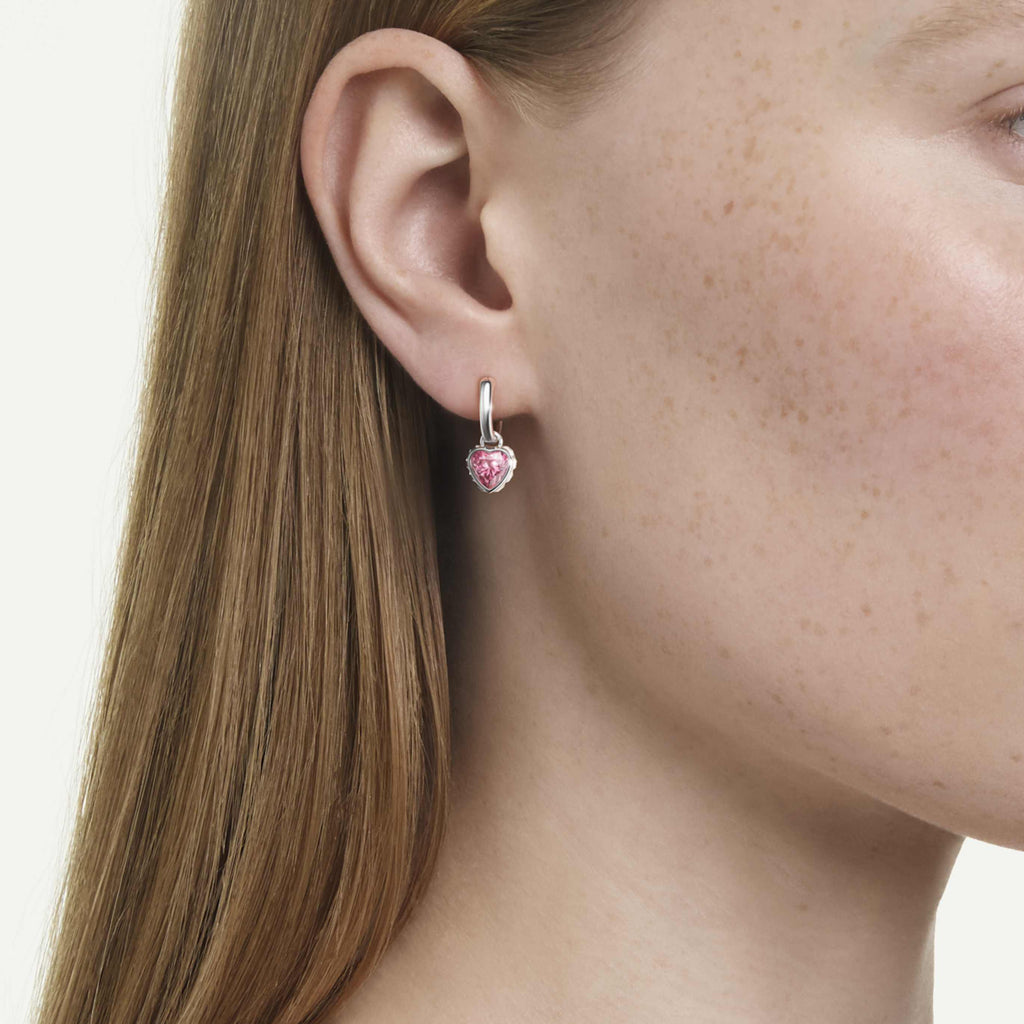 Swarovski Chroma drop earrings featuring a heart motif with red accents and an 18K gold finish