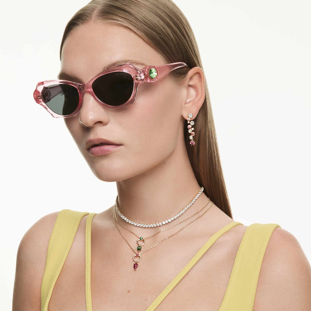 Swarovski Constella set with multicolored mixed-cut accents and an 18K gold finish