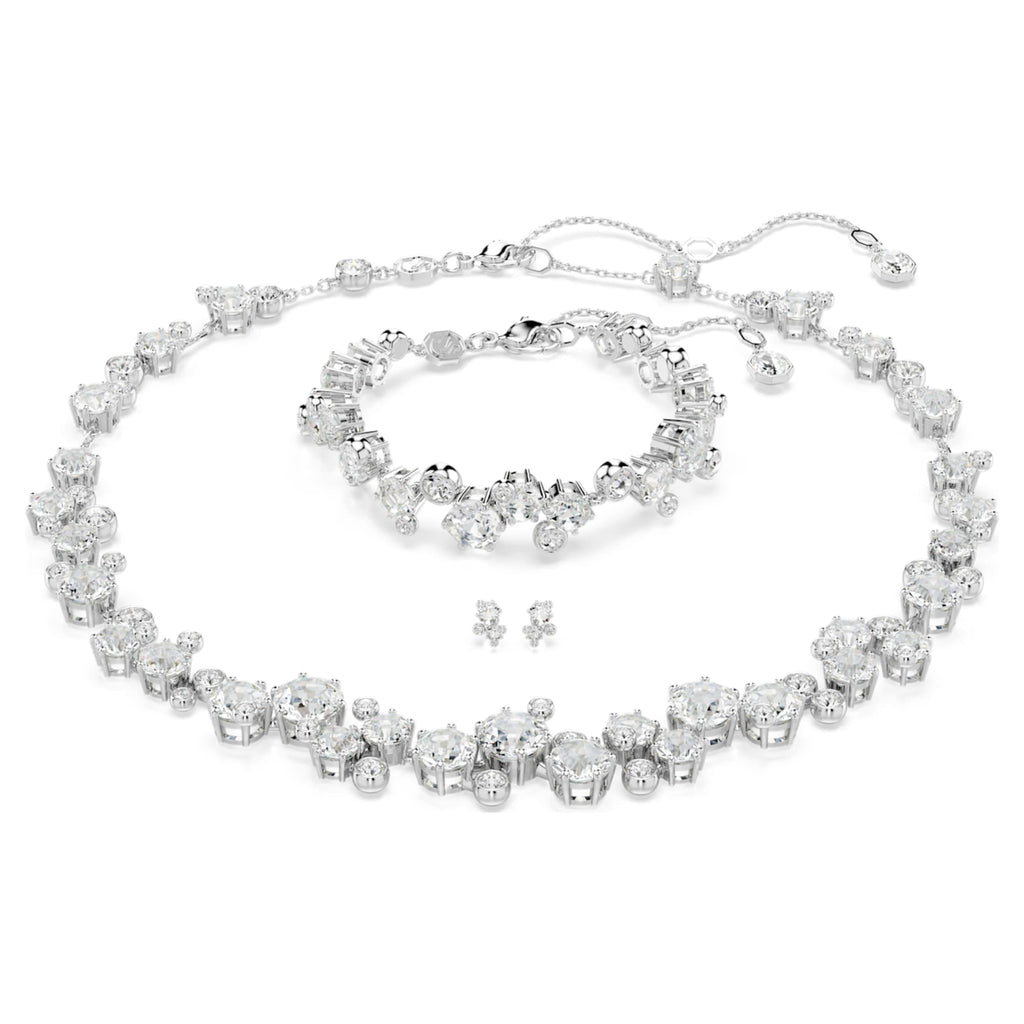 Swarovski Constella set with white mixed-cut accents and rhodium plating