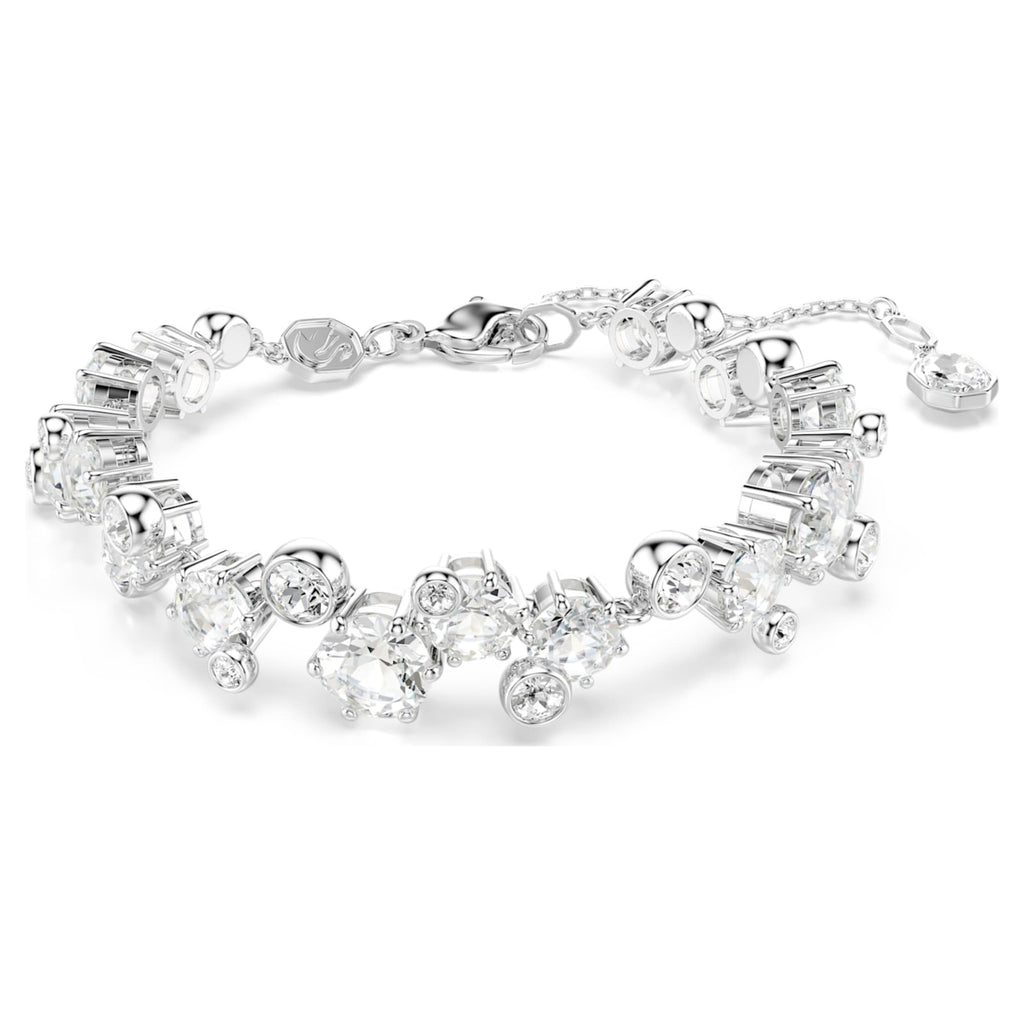 Swarovski Constella set with white mixed-cut accents and rhodium plating