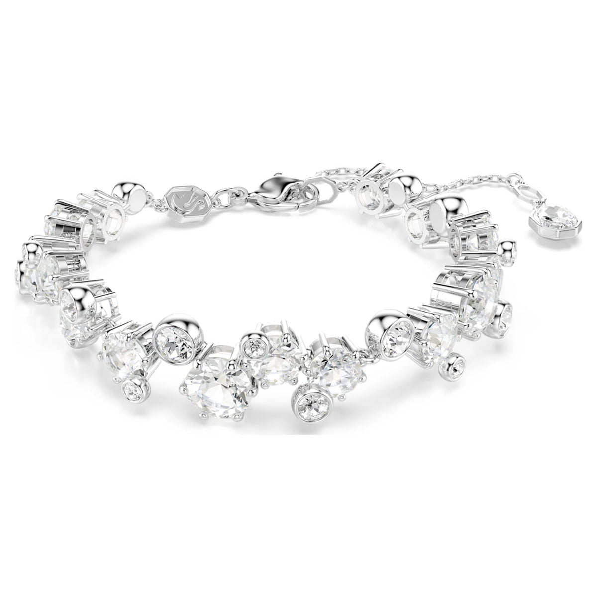 Swarovski Constella set with white mixed-cut accents and rhodium plating