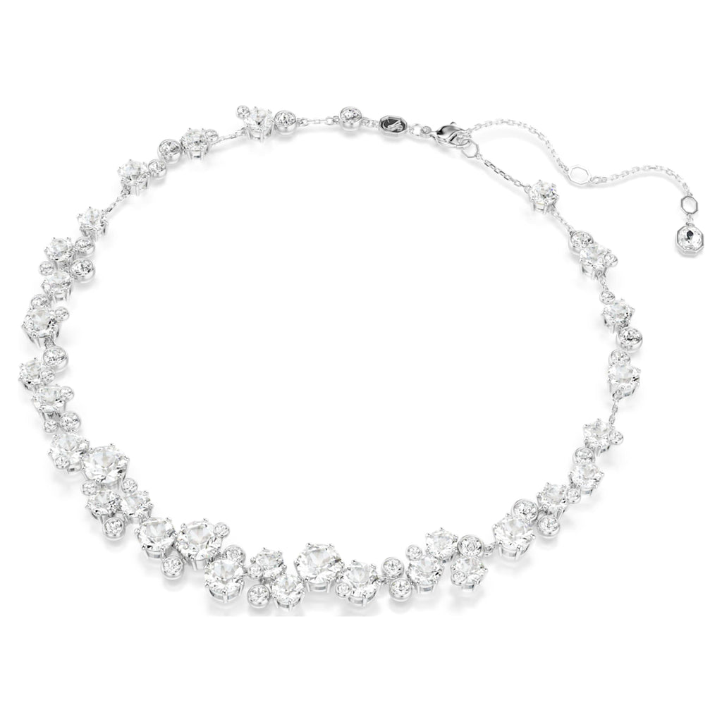 Swarovski Constella set with white mixed-cut accents and rhodium plating