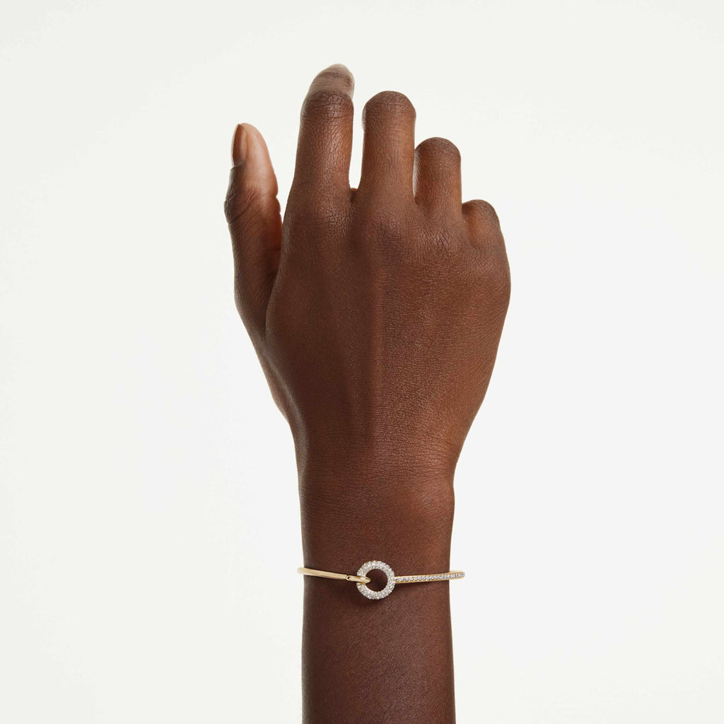 Swarovski Dextera bangle with white round-cut accents and rhodium plating