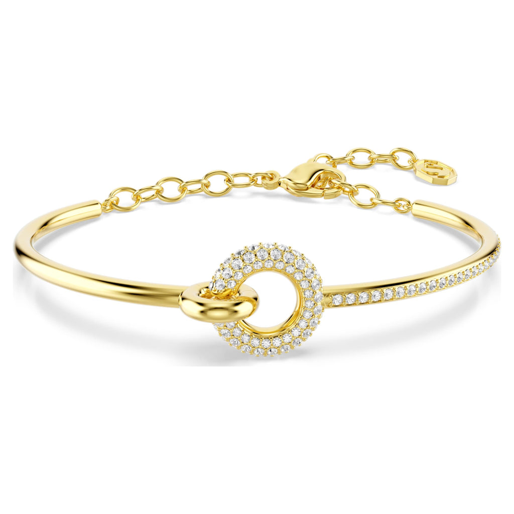 Swarovski Dextera bangle with white round-cut accents and an 18K gold finish