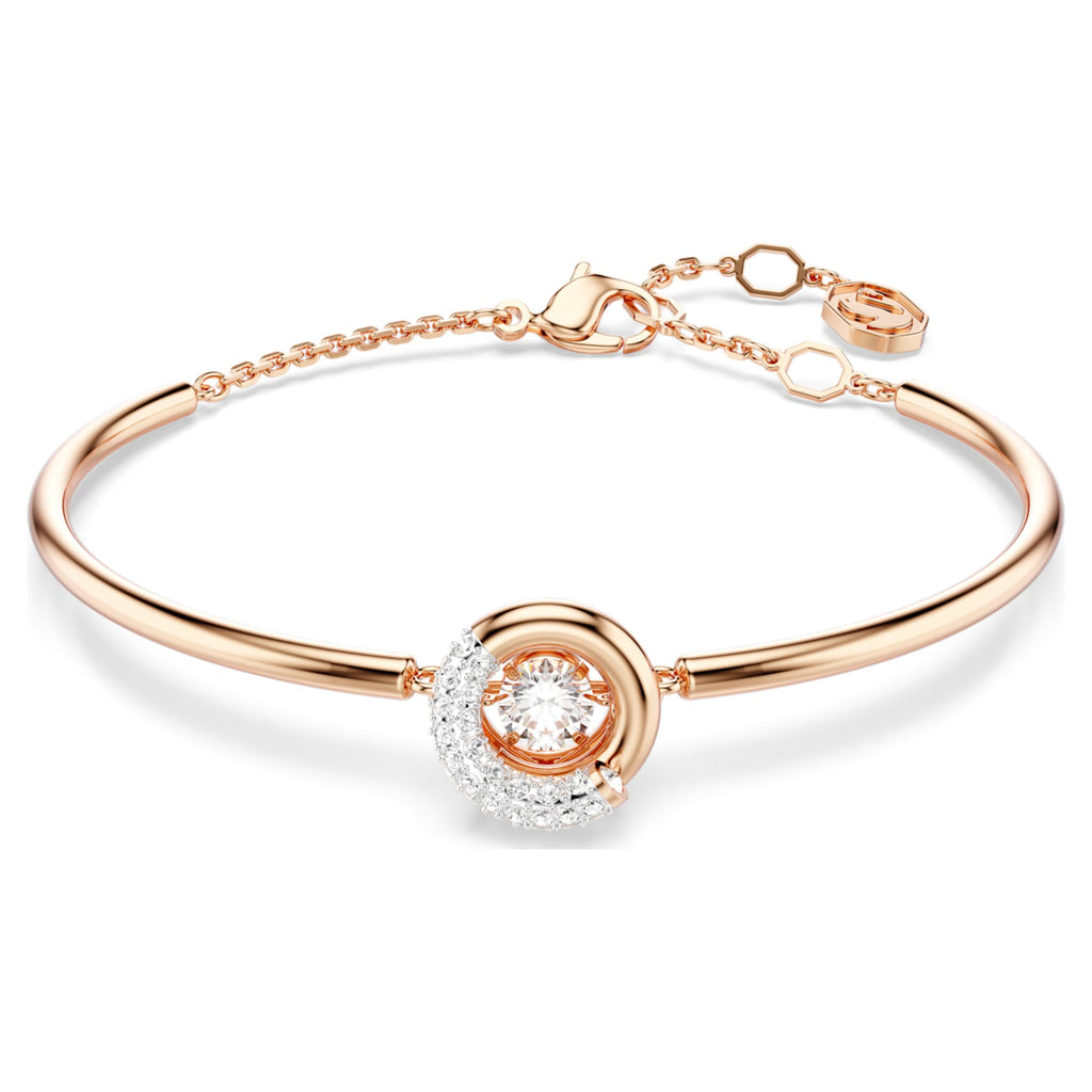 Swarovski Dextera bangle with white round-cut accents and an 18K rose gold finish