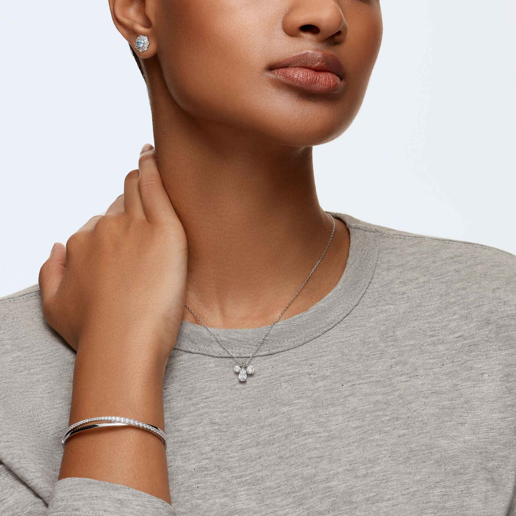 Swarovski Hyperbola bangle with white round-cut accents and rhodium plating