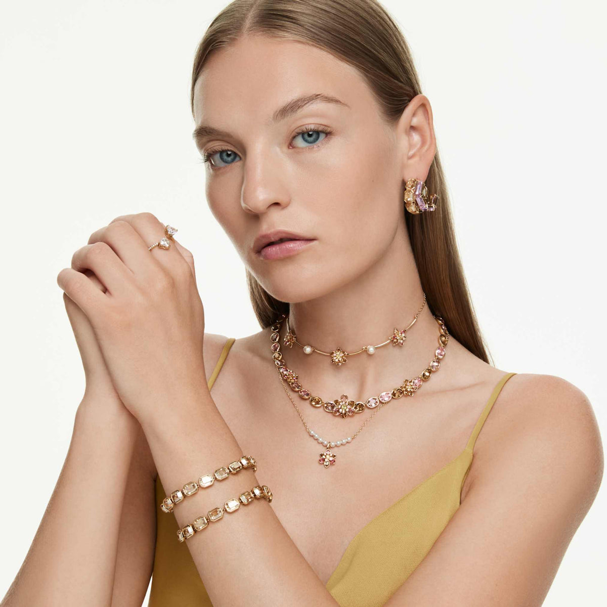 Swarovski Idyllia necklace featuring a flower motif with multicolored mixed-cut accents and an 18K gold finish