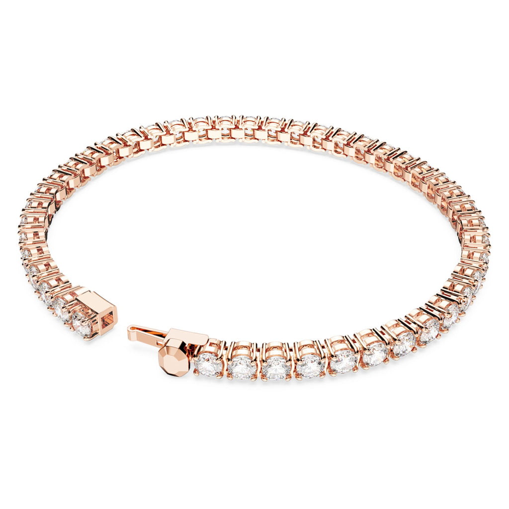 Swarovski Matrix Tennis bracelet with white round-cut accents and an 18K rose gold finish