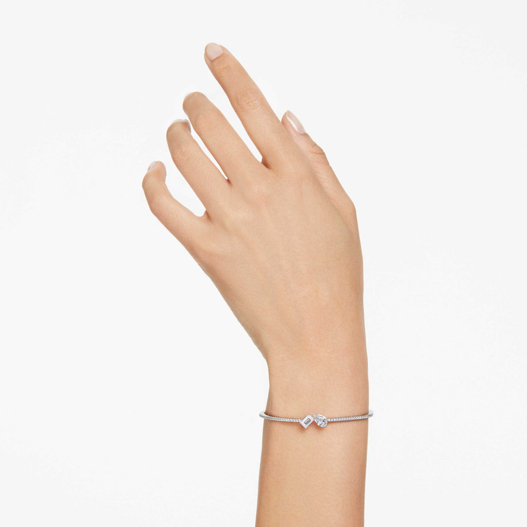 Swarovski Mesmera bangle with white mixed-cut accents and an 18K rose gold finish