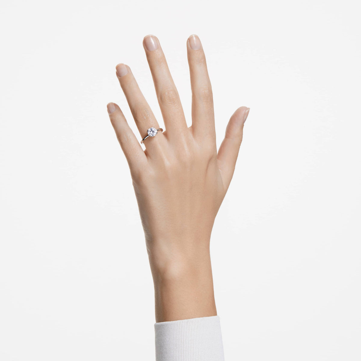 Swarovski Stilla cocktail ring with white round-cut accents and an 18K gold finish