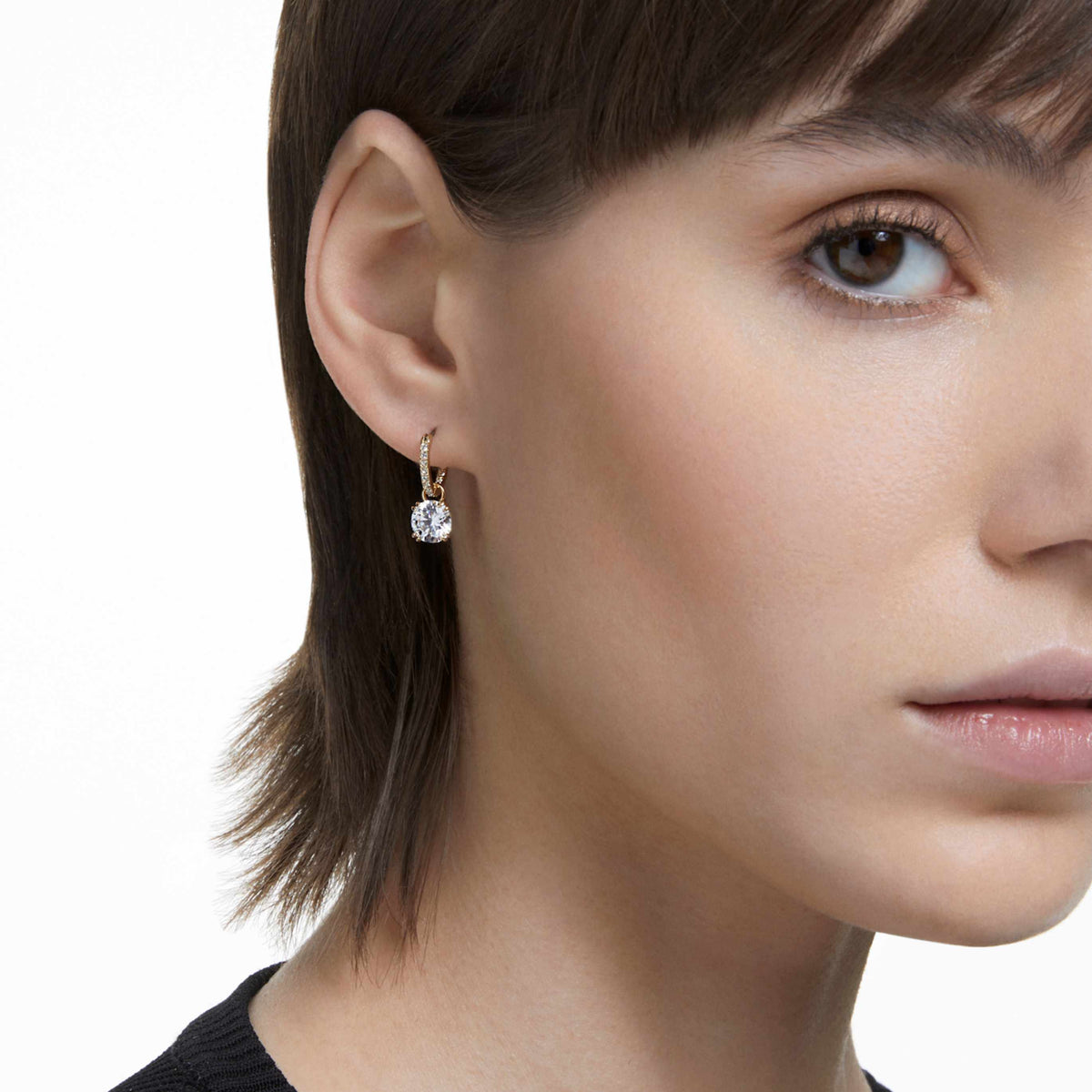 Swarovski Stilla drop earrings with white round-cut accents and an 18K rose gold finish