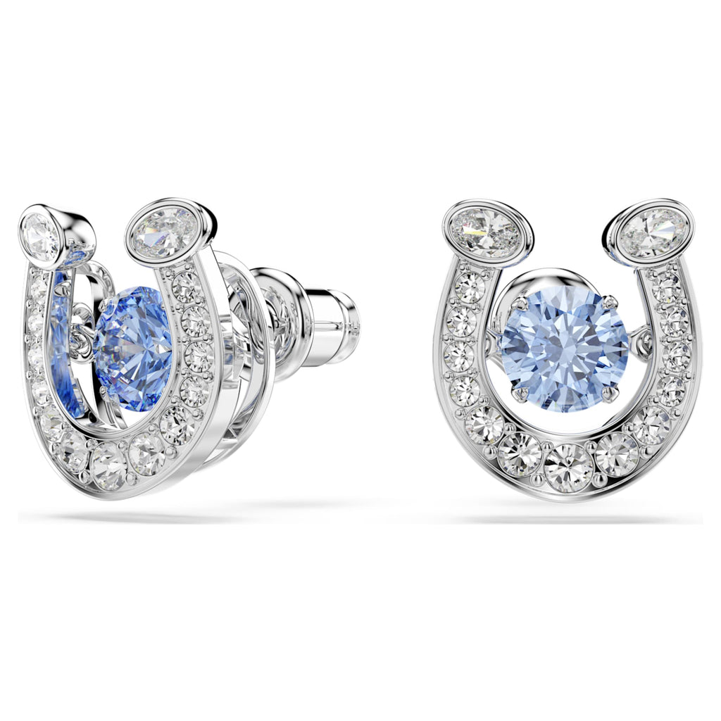 Swarovski Symbolica stud earrings featuring a horse shoe motif with blue round-cut accents and rhodium plating